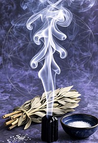 Protection ritual using sage smoke, black tourmaline, and salt water to clear negative energies.